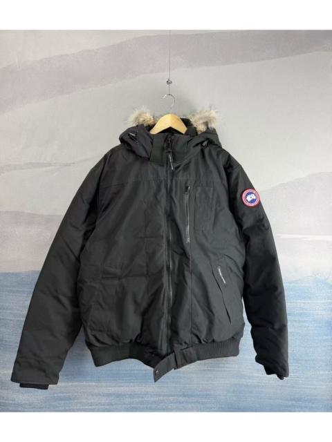 Canada Goose Canada Goose black down jacket with logo and fur-trimmed hood.