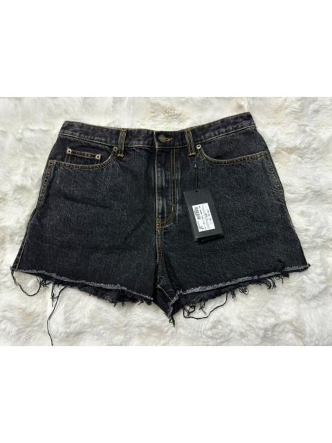 SAINT LAURENT Brand new Saint Laurent (YSL) distressed denim shorts with fringe detail.