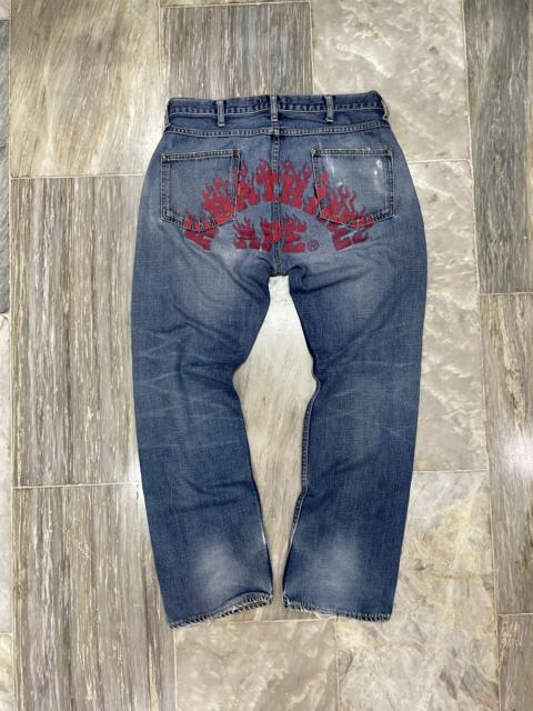 A BATHING APE® OG Bape Spellout Flame Arch Logo - Distressed Jeans