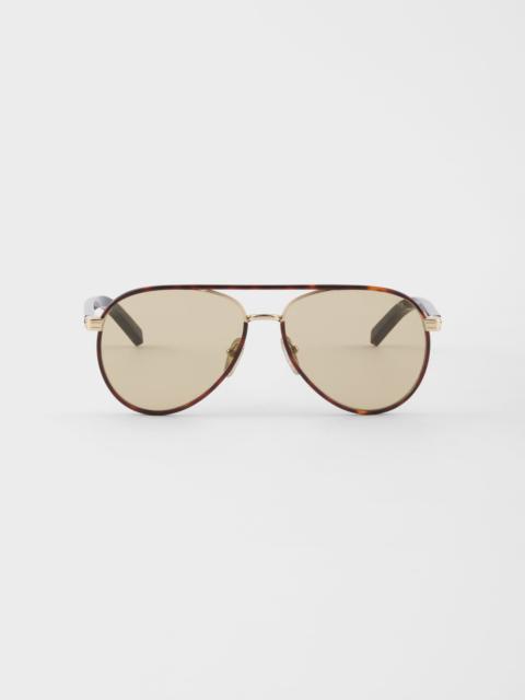Prada Prada sunglasses with the iconic metal plaque