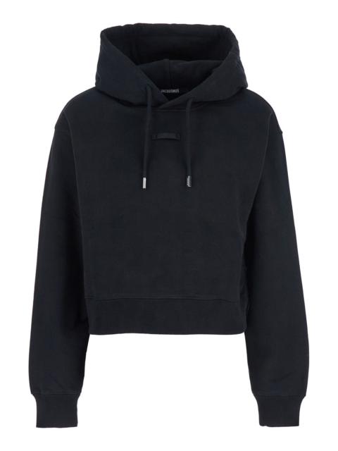 JACQUEMUS Jacquemus Women 'Le Hoodie Gros Grain' Black Cropped Hoodie With Drawstring Hood And Logo Patch On T