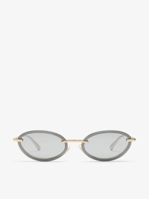 JIMMY CHOO Zina
Pale Gold Oval Sunglasses
