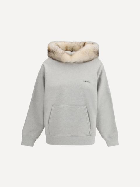 Prada Hoodie features a hood lined in shearling