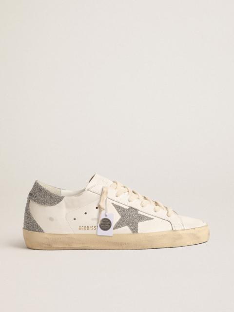 Golden Goose Super-Star with a silver Swarovski crystal star and heel tab