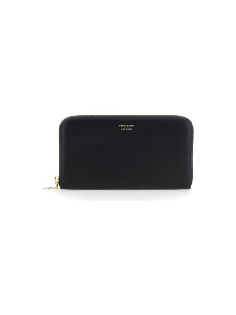 FERRAGAMO 'continental' Black Wallet With Logo Lettering On The Front In Leather Woman