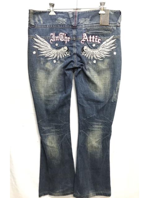 Distressed Denim - In The Attic Embroided wings bow cut denim