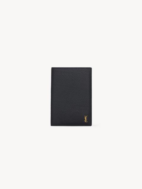 SAINT LAURENT TINY CASSANDRE PASSPORT CASE IN GRAINED LEATHER