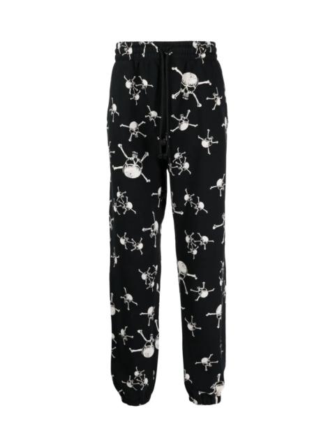 SAINT M×××××× SKULL-PRINT COTTON TRACK PANTS