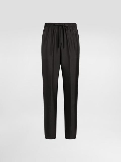 Dolce & Gabbana Silk jogging pants with DG embroidered patch
