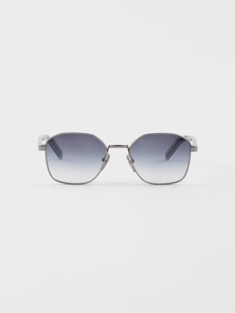 Prada Sunglasses with the iconic metal plaque