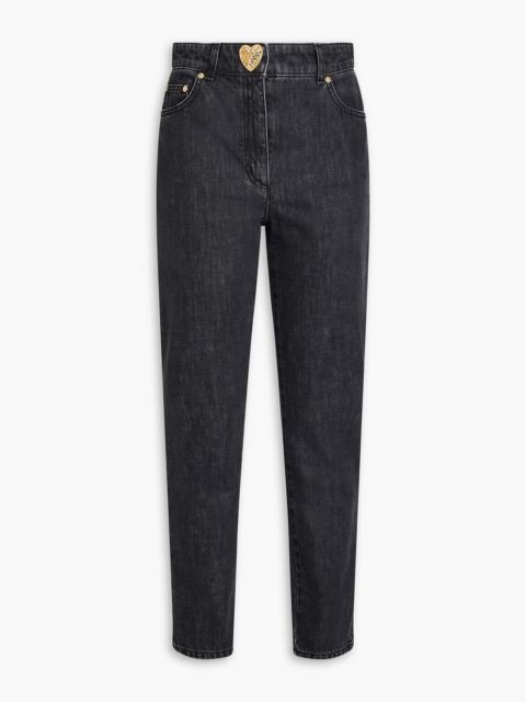 Moschino Button-embellished high-rise slim-leg jeans