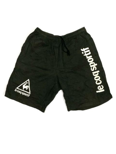 Other Designers Le Coq Sportif big logo shorts