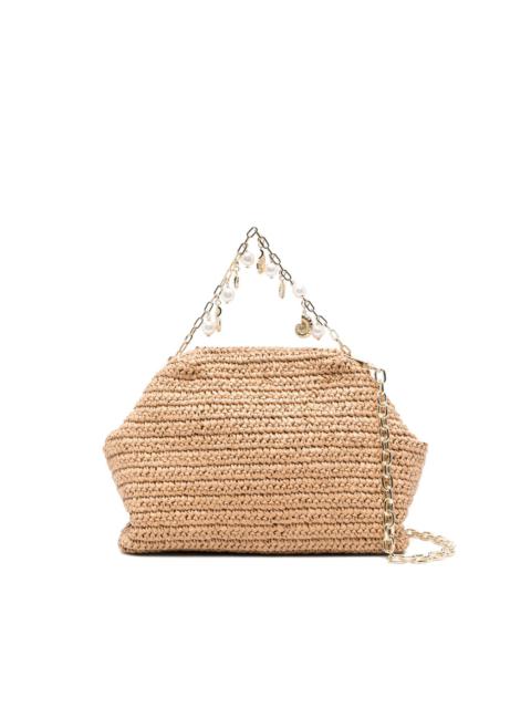 charm-detail raffia clutch bag