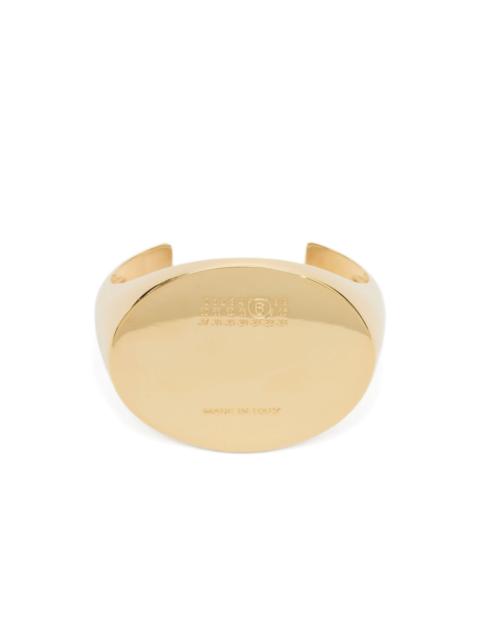 MM6 Maison Margiela logo-engraved cuff bracelet