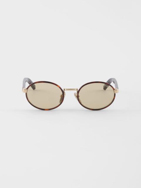 Prada Prada sunglasses with the iconic metal plaque