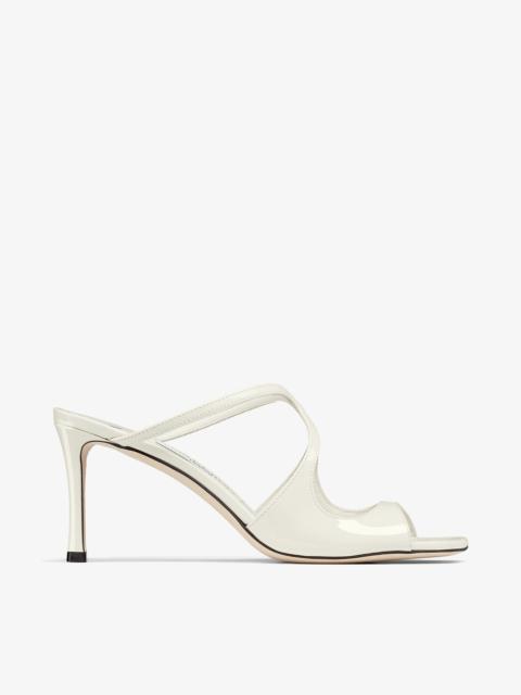 JIMMY CHOO Anise 75
Latte Patent Leather Mules