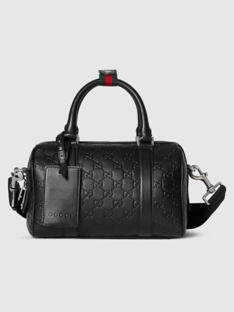 GUCCI GG Emblem small duffle bag