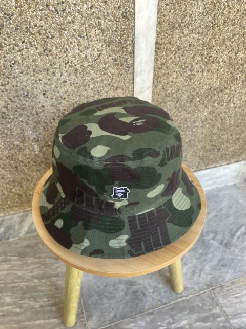 BAPE x UNDEFEATED COLOR CAMO FLANNEL BUCKET HAT REVERSIBLE