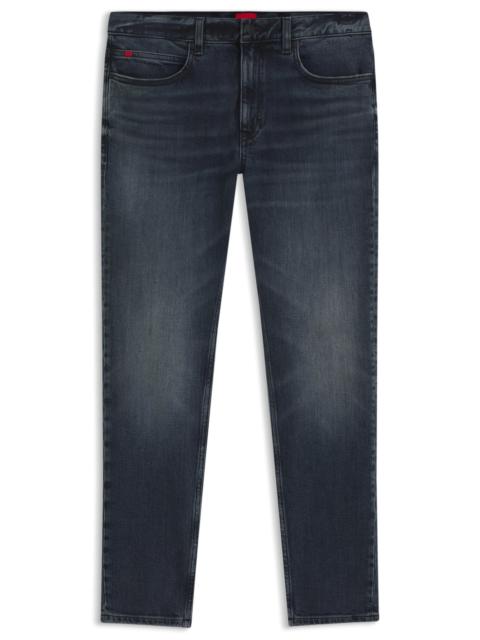 HUGO EXTRA-SLIM-FIT JEANS IN MID-BLUE STRETCH DENIM