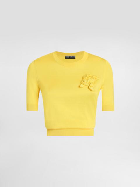 Dolce & Gabbana Short-sleeved silk sweater with flower embellishment