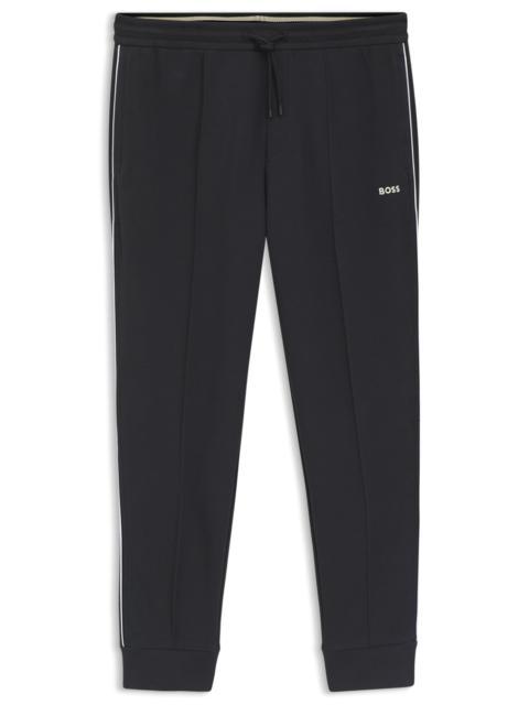 BOSS PIPING-DETAIL TRACKSUIT BOTTOMS IN A COTTON BLEND
