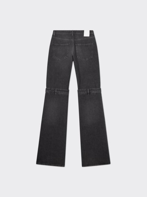 COPERNI Dark grey jeans with open knee engineering.