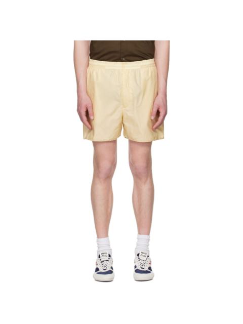 AURALEE Yellow Light Sheer Nylon Shorts