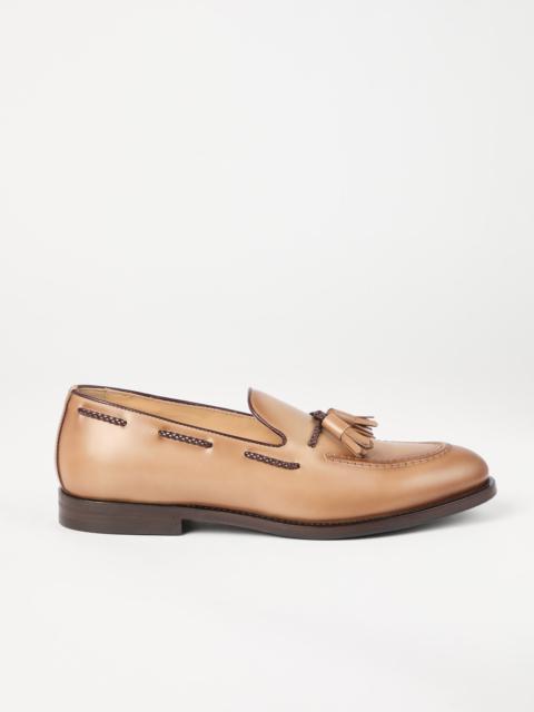 Brunello Cucinelli Polished calfskin penny loafers with tassels