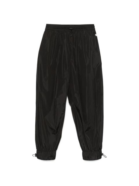 daisy-embellished track pants