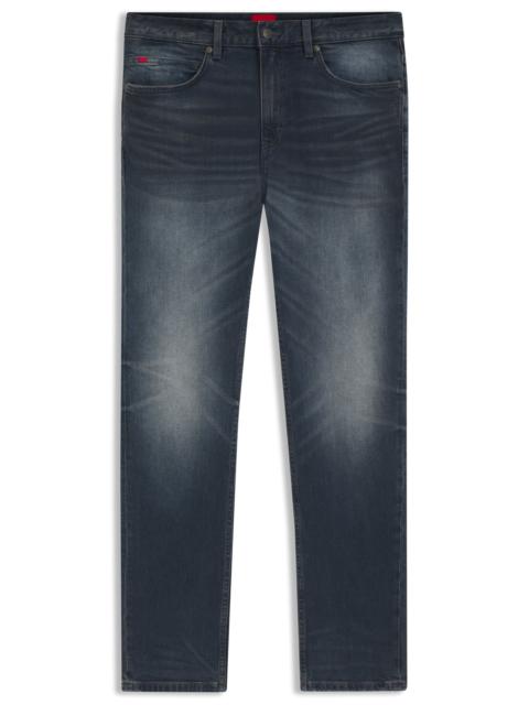 HUGO SLIM-FIT JEANS IN USED-EFFECT BLUE STRETCH DENIM