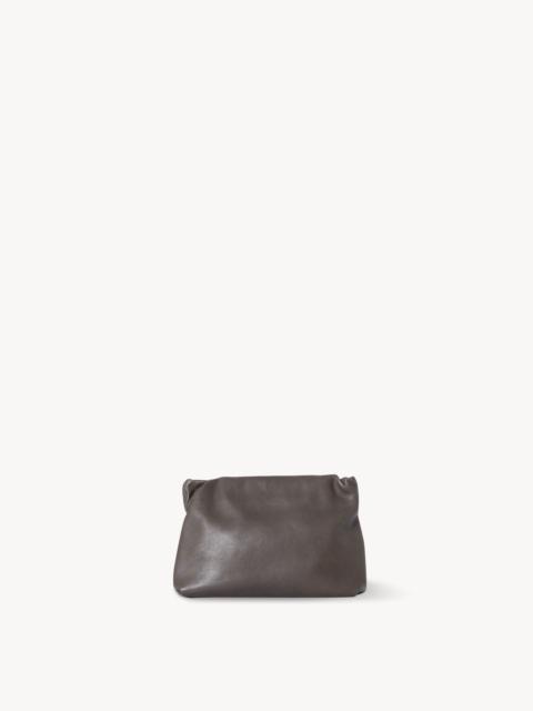 The Row Bourse Clutch Bag in Leather