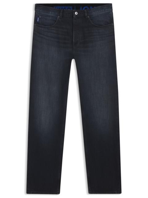HUGO DARK-BLUE REGULAR-FIT JEANS IN STONEWASHED DENIM