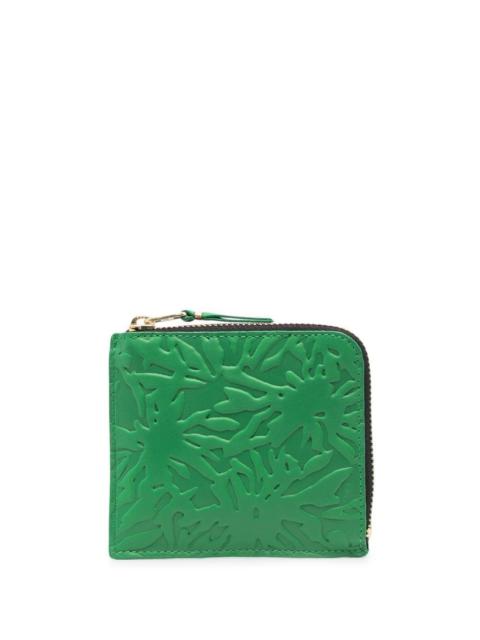 Comme Des Garçons embossed zip-up wallet