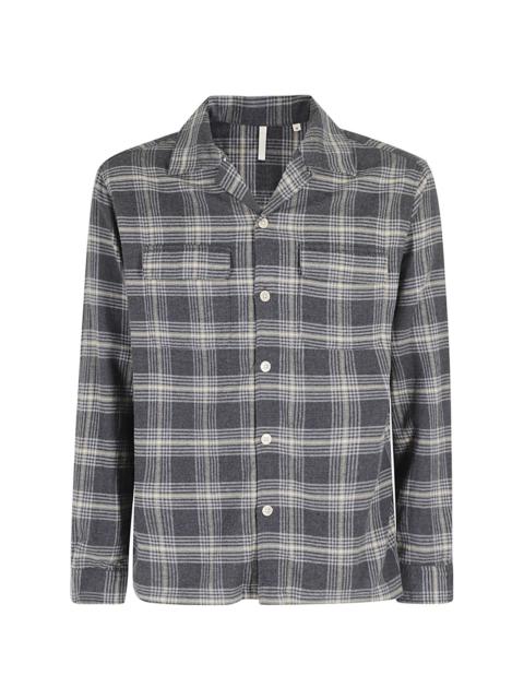 buttoned plaid shirt