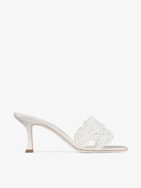 JIMMY CHOO Cary Mule 70
Ivory Satin Mule Sandal with Pearl Embellishments