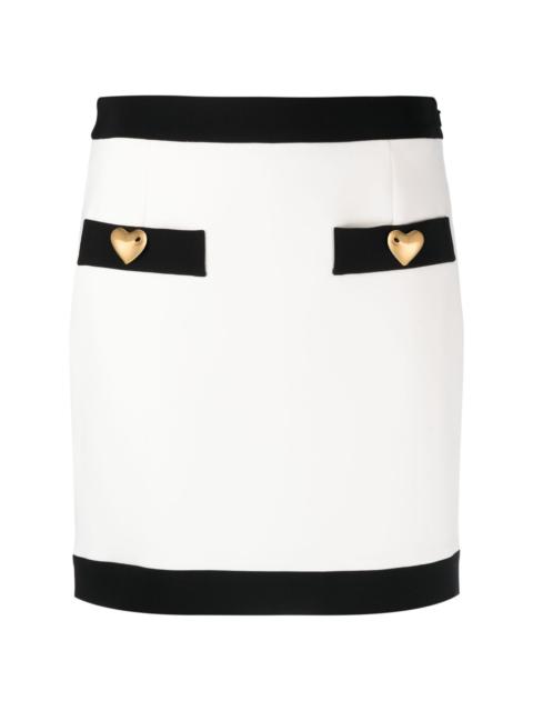 Moschino button-detailed fitted skirt
