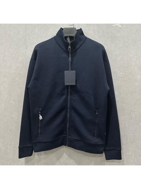 Louis Vuitton Louis Vuitton embossed logo jacket with all-over print.