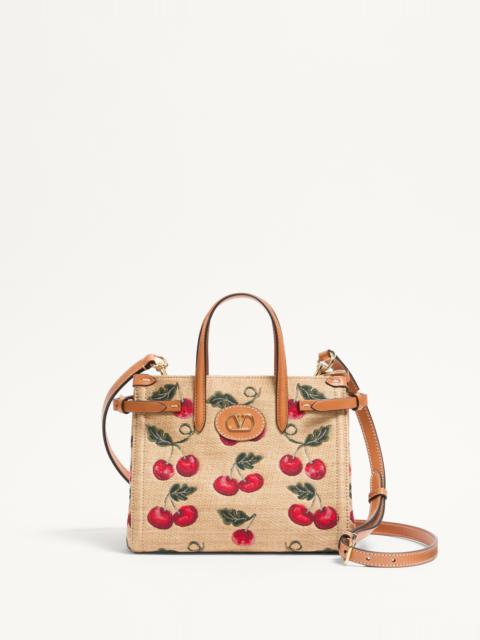 Valentino VALENTINO GARAVANI ANTIBES SMALL SHOPPING BAG IN JACQUARD RAFFIA WITH CHERRYFIC PATTERN
