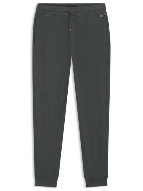BOSS WAFFLE-STRUCTURE TRACKSUIT BOTTOMS IN A COTTON BLEND