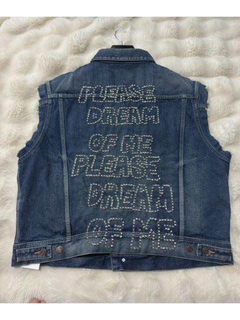 CELINE Celine's new runway-edition denim vest featuring elaborate stud detailing.