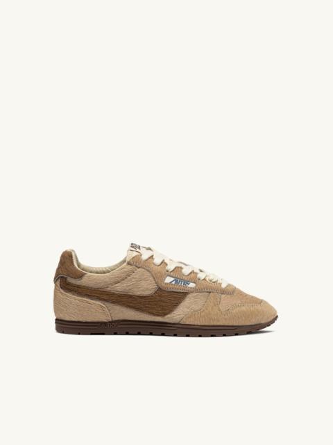 AUTRY WINDSPIN SNEAKERS IN BEIGE AND BROWN PONY HAIR EFFECT