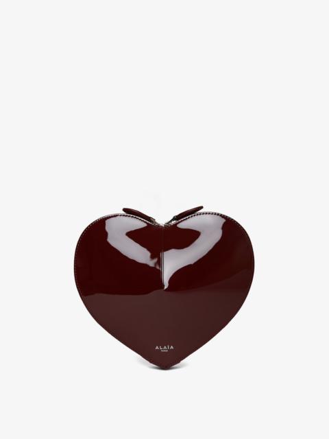 Alaïa Le Coeur dark red patent crossbody bag
