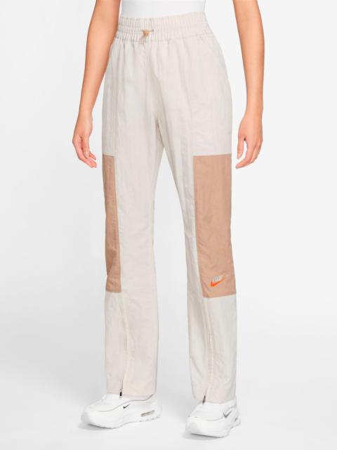 Nike WOMEN'S NIKE SPORTSWEAR CITY UTILITY WOVEN HIGH-RISE PANTS