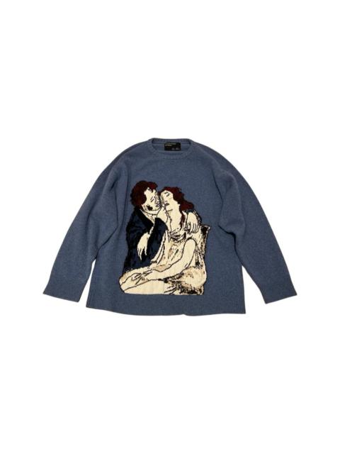 Boy wipes girl’s tears crewneck sweater