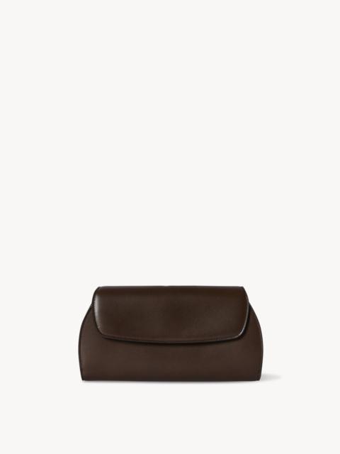 The Row Curved Clutch in Leather