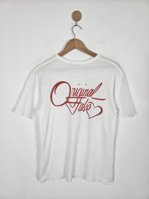Other Designers Original Fake Kaws shirt