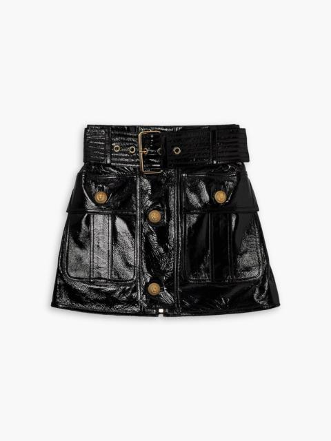 Balmain Belted crinkled patent-leather mini skirt