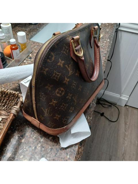 Louis voutian bag what with dark brown