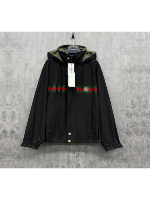 GUCCI GUCCI heavyweight gold-buttoned reversible jacket with 3D logo.