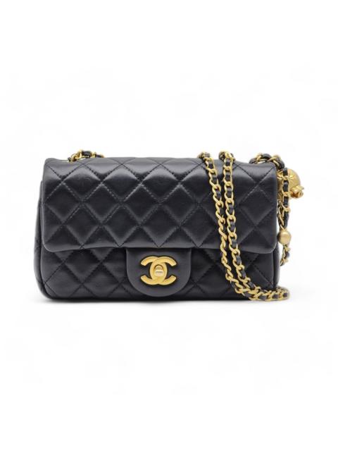 CHANEL Quilted Lambskin Leather Pearl Crush Mini Flap Bag in Black